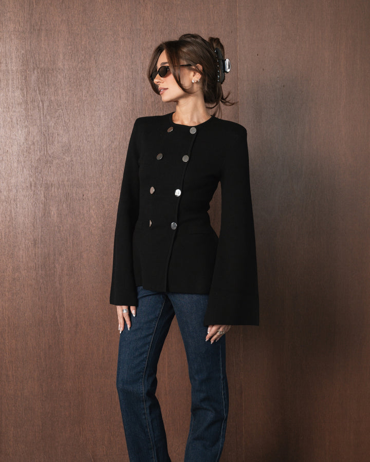 Danielle Bernstein of WeWoreWhat wearing F25 Cotton Collection black blazer