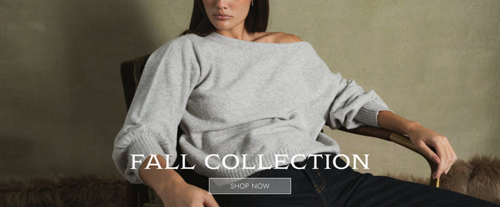 Woman wearing a gray sweater sitting on a chair with 'Fall Collection' text overlay for WeWoreWhat